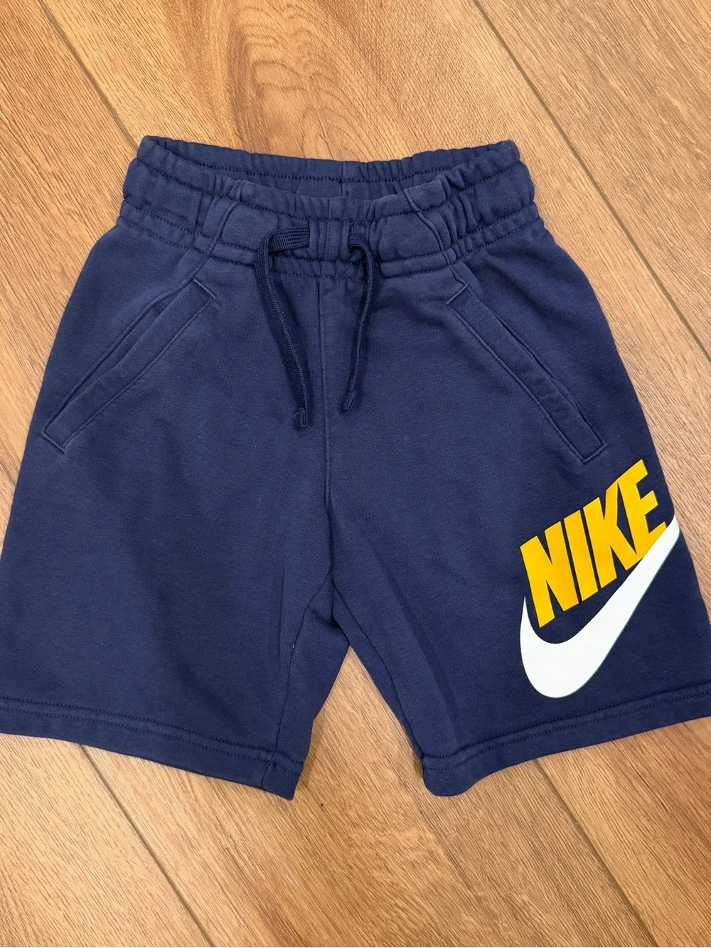 Nike Boys Navy Shorts with Yellow and White Logo
